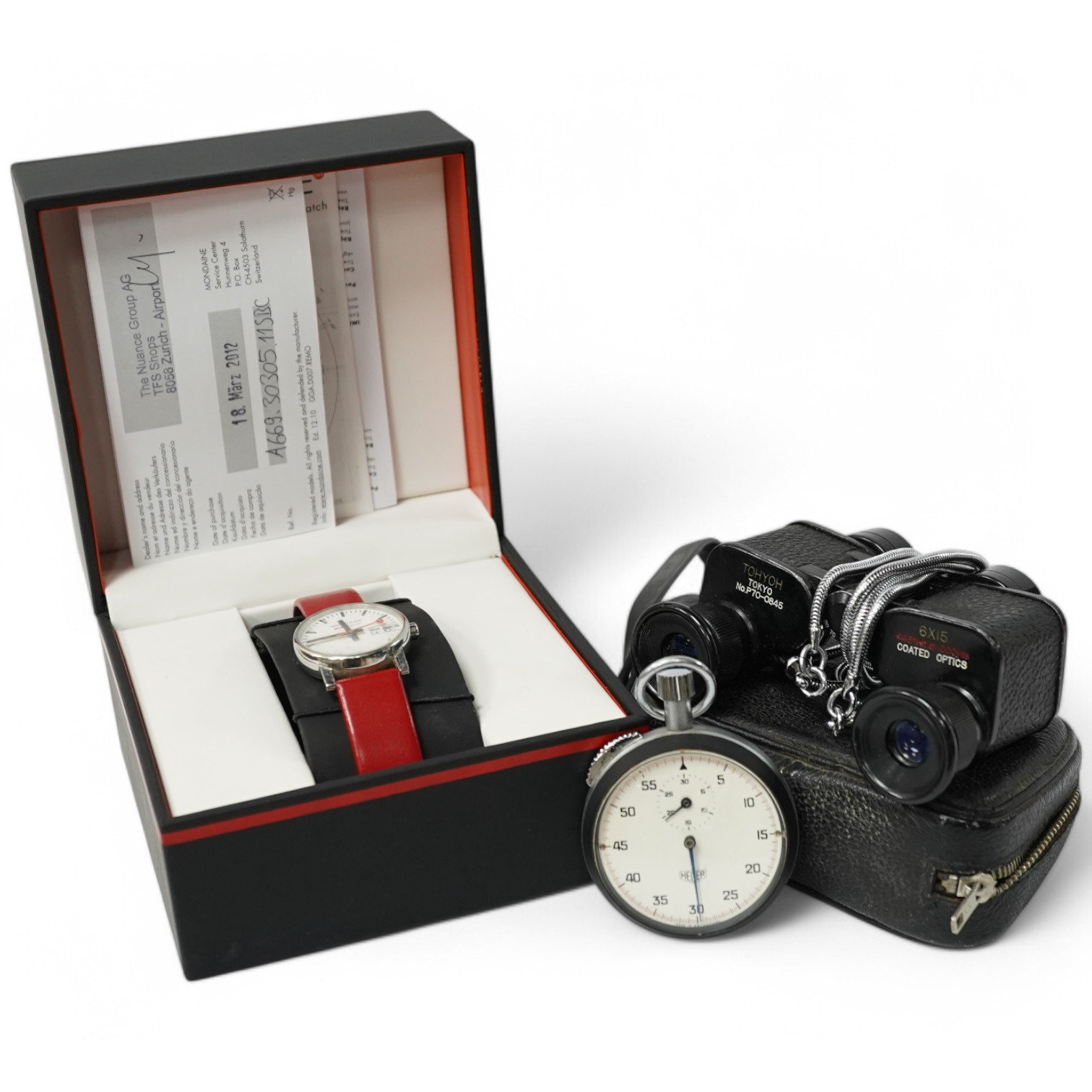Sundry items comprising a gent's dress watch, Heuer stopwatch and opera glasses. Condition - varies